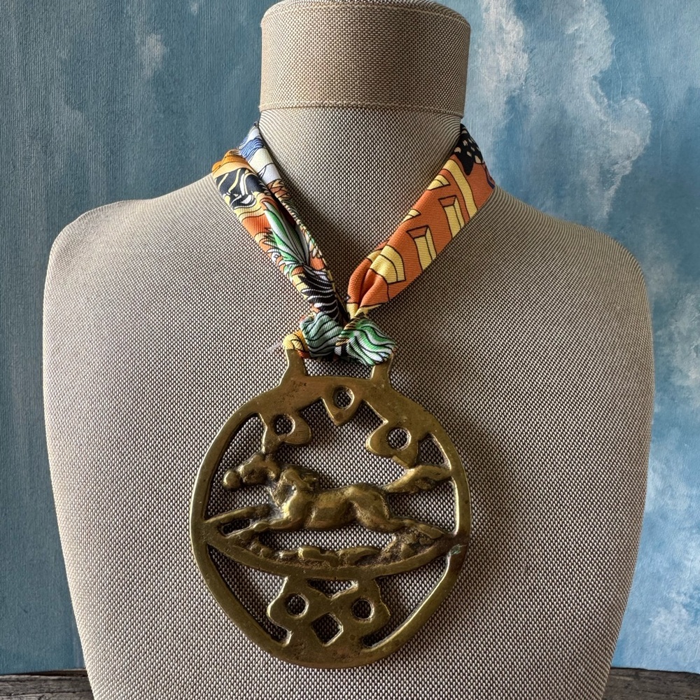 Bold Brass Horse Medallion Pendant on Printed Silk Scarf